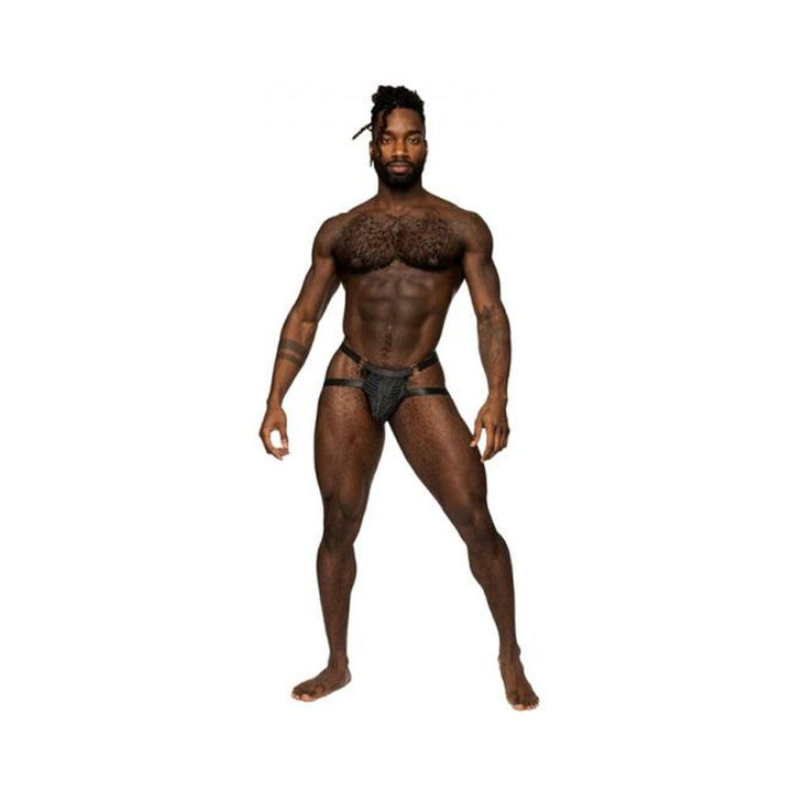 Athletic man wearing Male Power Rude Awakening black mesh ring jock with satin waistband and leg bands, standing confidently.