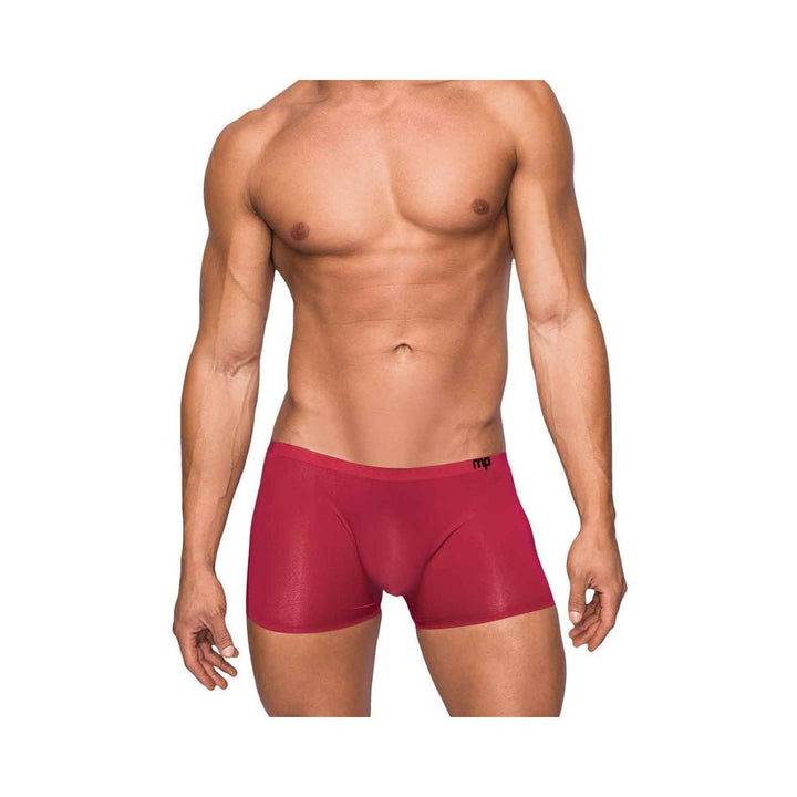 Male model wearing seamless wine-colored sleek shorts with a low-rise waist and sheer pouch detail.