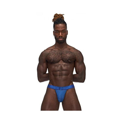 Muscular man wearing blue Male Power Sexagon Strappy Ring Jock with branded waistband and perforated fabric front panel.