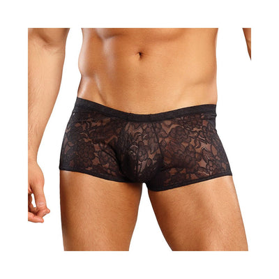 Male model wearing black stretch lace mini shorts with floral pattern and low-rise waist.