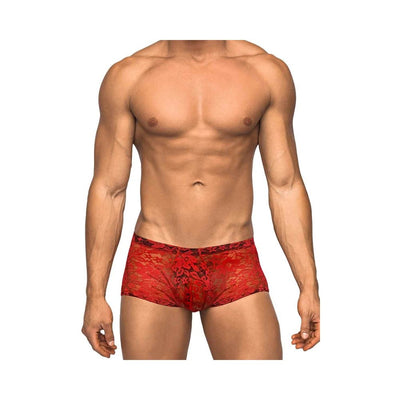 Male model wearing red stretch lace mini shorts with floral pattern on a white background.