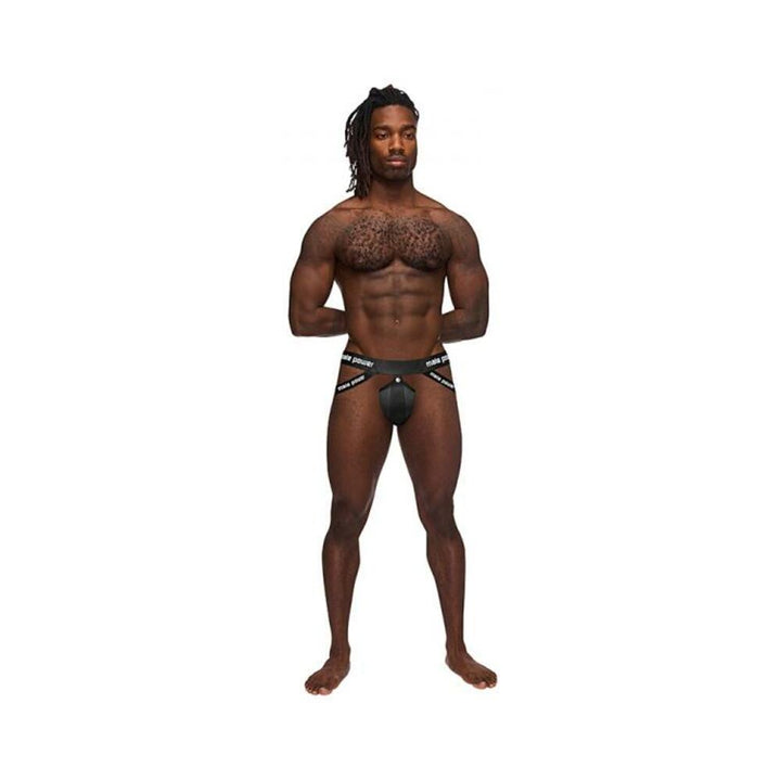 Athletic man wearing black Male Power Helmet Jock with padded pouch and branded satin waistband on white background.