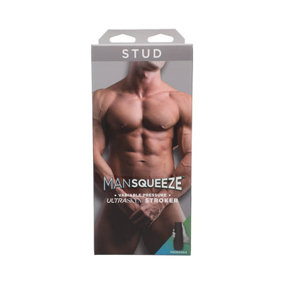 Packaging of Man Squeeze Stud Ass stroker featuring a muscular male torso and product branding on a gray background.
