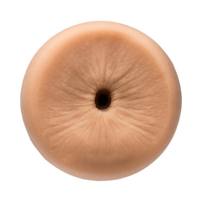 Close-up of a flesh-toned male masturbator with a realistic textured opening and circular shape.