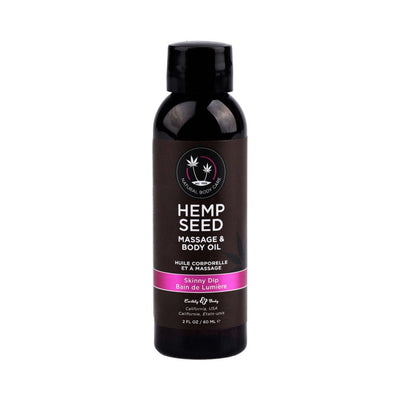 2 oz bottle of Earthly Body Hemp Seed Massage and Body Oil in Skinny Dip scent with black cap and label.