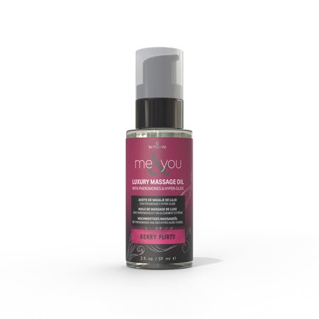 Bottle of Me and You luxury massage oil in Berry Flirty scent with pump dispenser and dark pink label