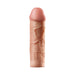 Realistic flesh-colored 2-inch penis extension sleeve with detailed veins and smooth tip on white background.