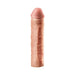Realistic skin-tone penis extension sleeve with textured surface and rounded tip on white background