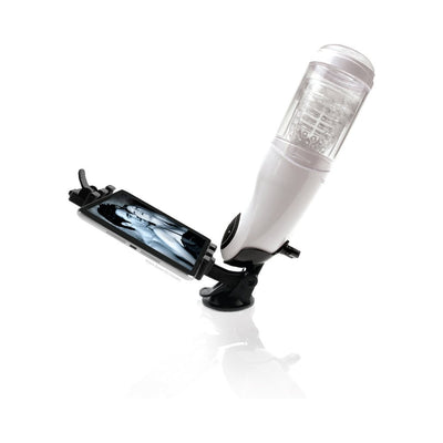 White Mega Bator rechargeable hands-free stroker with suction base and mobile device holder displaying black and white image.