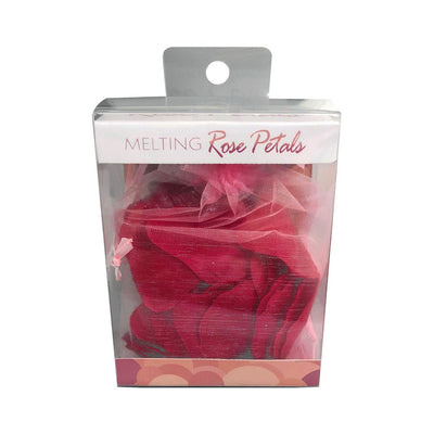 Package of red melting rose petals in a pink mesh bag inside clear display box with white and pink label.