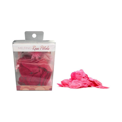 Melting rose petals in a sheer pink bag inside clear packaging with loose pink petals beside it on white background.