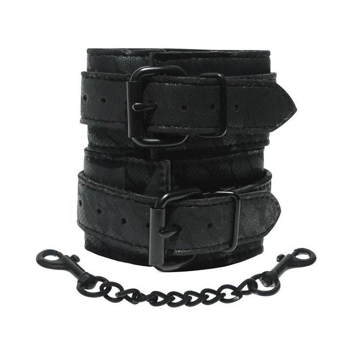 Black lace wrist cuffs with adjustable buckles and a detachable black metal chain with clasps.