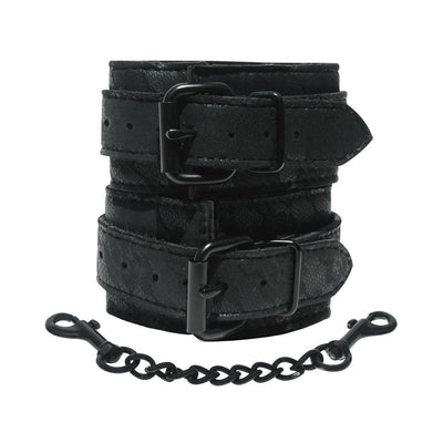 Black lace wrist cuffs with adjustable buckles and a detachable black metal chain with clasps.