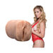 Cherie DeVille posing in red lace lingerie next to a lifelike textured stroker toy molded from her.