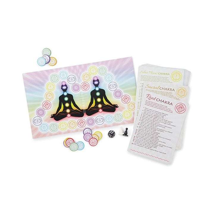 Mind, Body, Soul board game with chakra-themed board, colorful chakra coins, question cards, dice, and game markers for couples' spiritual connection.