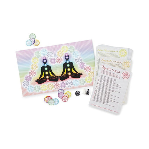 Mind, Body, Soul board game with chakra-themed board, colorful chakra coins, question cards, dice, and game markers for couples' spiritual connection.