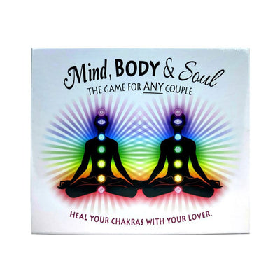 Mind, Body & Soul board game box featuring two meditating silhouettes with colorful chakra symbols and radiant energy background.