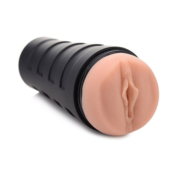 Tan realistic textured stroker with black ribbed outer case for grip and control.