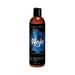 Bottle of Mojo Peruvian Ginseng water-based personal lubricant with black label and blue smoke design, 4 oz size.