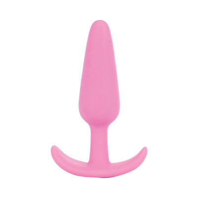 Large pink silicone butt plug with curved T-shaped base for safe and comfortable use.