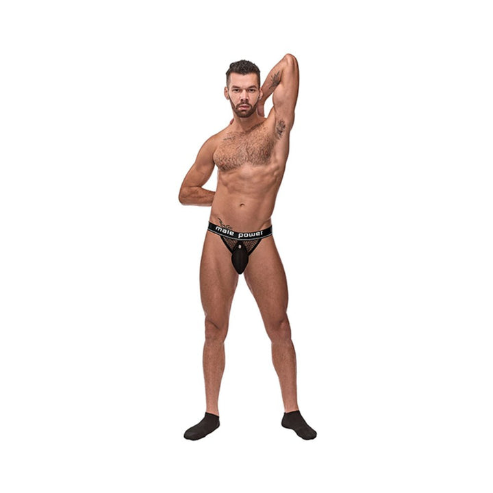 Male model wearing black Cock Pit fishnet cock ring jock with snap off pouch and branded waistband.