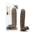Realistic chocolate-colored 10.5-inch dildo with suction cup base displayed in packaging and standing upright outside package.