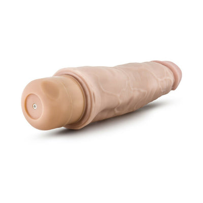 Beige realistic textured vibrator with twist-dial base, designed for lifelike feel and easy use.