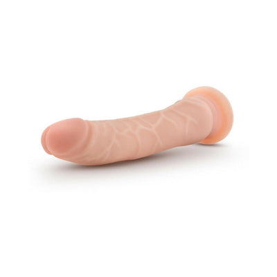 Slim realistic dildo with suction cup base in natural skin tone, featuring detailed veiny texture and soft dual-density material.