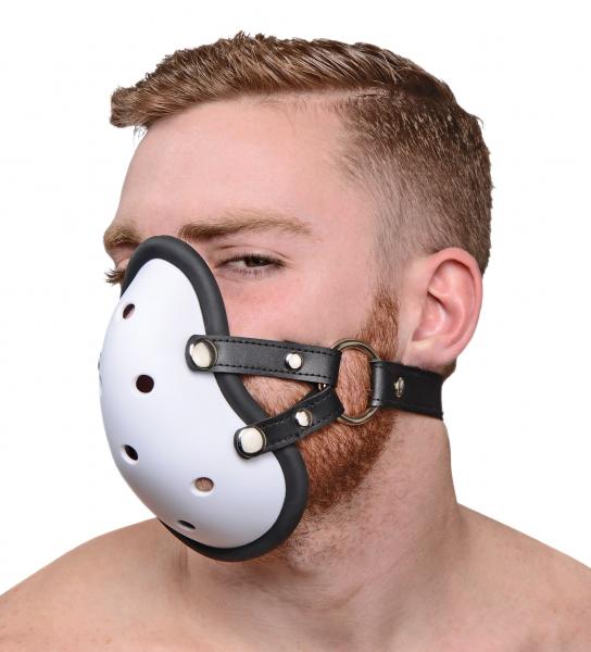 Man wearing a white athletic cup style muzzle with black straps and metal rivets against a white background.