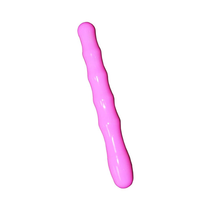 Slim pink tapered vibrator with beaded texture, designed for beginner-friendly anal and vaginal use.