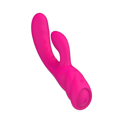 Pink silicone dual-action personal vibrator with curved design and control buttons on the handle.
