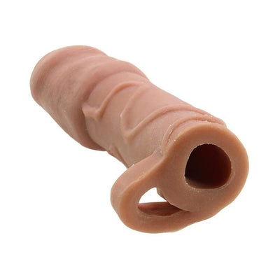 Brown natural realskin uncircumcised penis extender sleeve with textured surface and open end design.