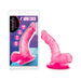 Pink 4-inch mini dildo with suction cup base displayed next to its Naturally Yours branded packaging.