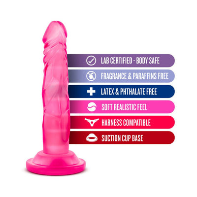 Pink mini dildo with suction cup base and text highlighting body safe, fragrance free, latex free, soft feel, harness compatible features.