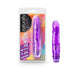 Compact purple multi-speed vibrator with realistic texture, shown in and out of colorful retail packaging.