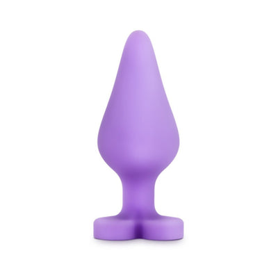 Purple silicone anal plug with heart-shaped base and smooth satin finish.