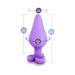 Purple silicone anal plug with heart-shaped base, showing dimensions of 3.5 inches length and 1.5 inches width.