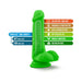 Green 6-inch dual density dildo with suction cup base and labeled features highlighting soft outer layer and firm inner core.
