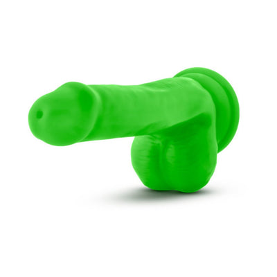 Green 6-inch dual density dildo with suction cup base and realistic texture including balls.