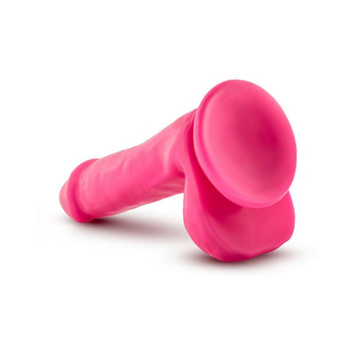 Pink 6-inch dual density dildo with suction cup base and attached balls on white background.
