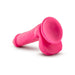 Pink 6-inch dual density dildo with suction cup base and attached balls on white background.