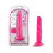 Pink 7.5 inch dual density dildo with suction cup base shown in and out of clear retail packaging.