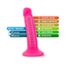 Bright pink 5.5 inch realistic dildo with dual density layers and suction cup base, highlighting body-safe and harness compatible features.