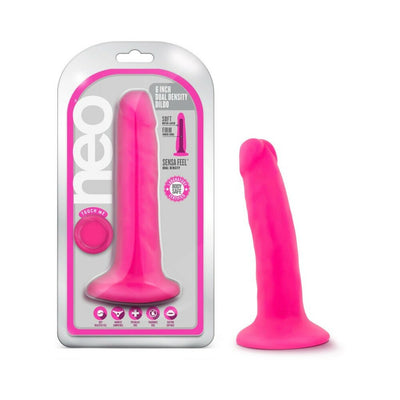 Pink 5.5 inch dual density realistic dildo with suction cup base, shown in packaging and standing upright.