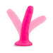 Bright pink 5.5 inch realistic dildo with suction base shown in multiple angled positions on white background.