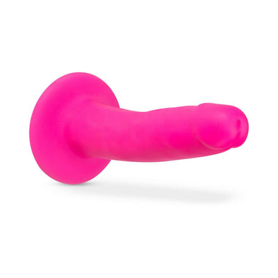 Bright pink 6-inch silicone dual-density dildo with suction cup base, designed for realistic feel and hands-free use.