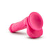 Bright pink silicone dual density dildo with suction cup base and detailed texture, 6 inches long.
