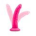 Bright pink 7.5-inch silicone dual density dildo with suction cup base shown upright and angled.