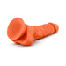 Orange silicone dual density dildo with suction cup base and realistic texture, 7.5 inches long with balls.