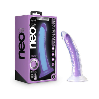Neo Elite 7-inch neon purple glow-in-the-dark dual-density silicone dildo with suction base and packaging box.